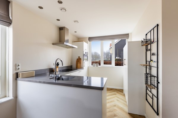 Foto - Te koop: Duurzame hoekwoning in kindvriendelijke wijk!